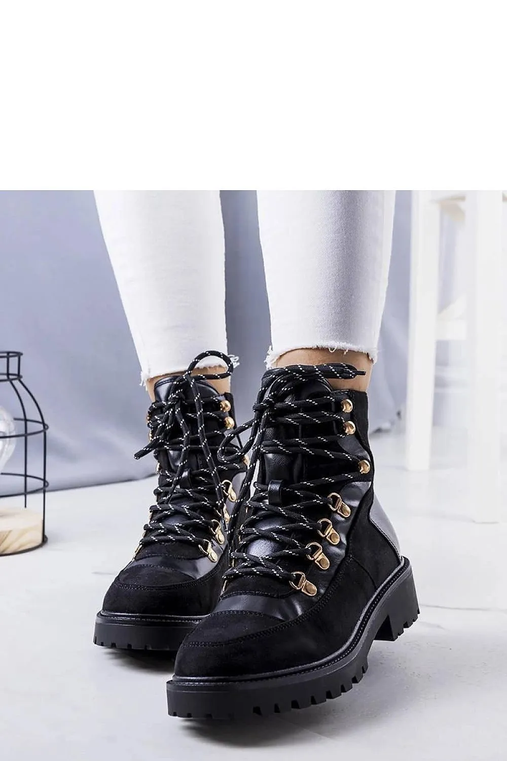 Black insulated work boots trappers