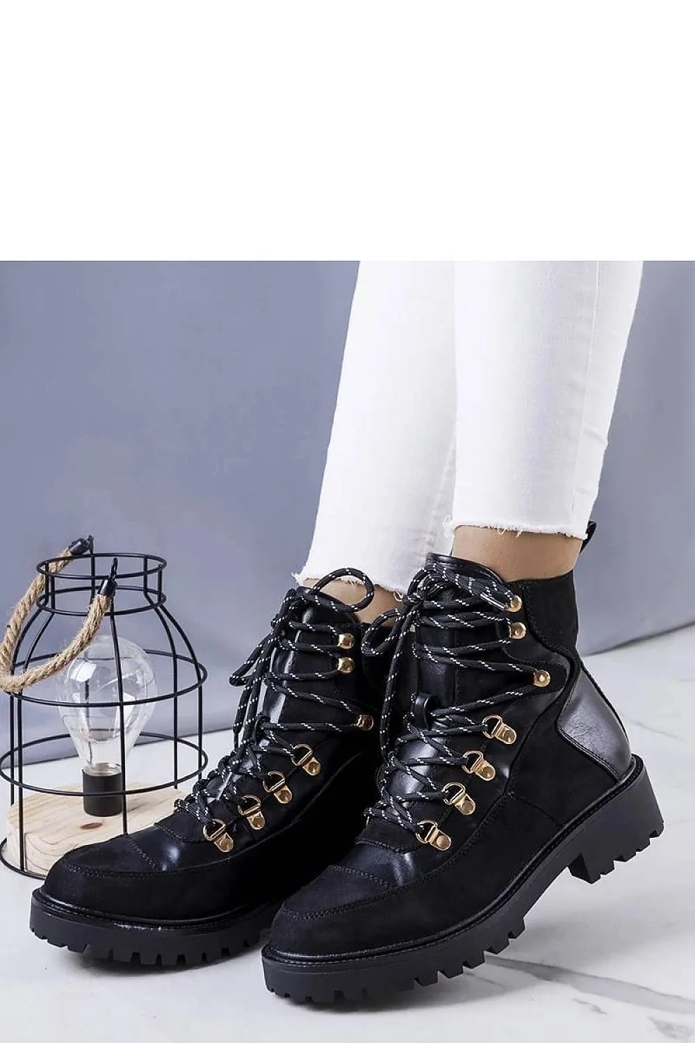 Black insulated work boots trappers