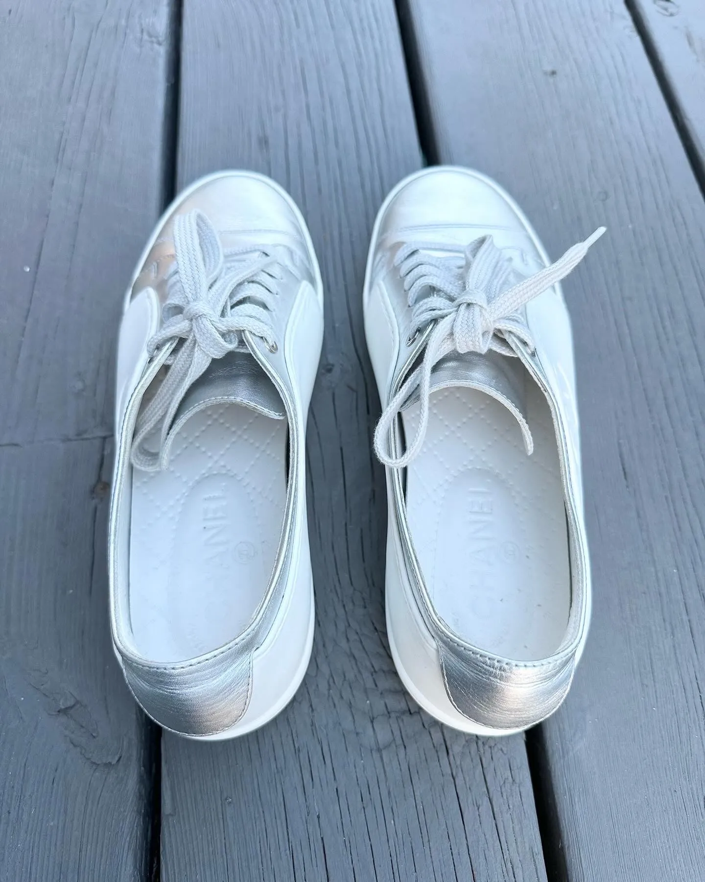 CHANEL Leather Rubber CC Logo Low Top Sneakers