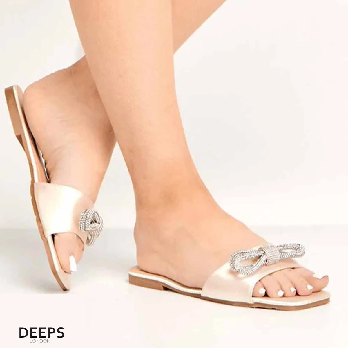 EMANI - WOMEN'S SATIN FLAT FORM SLIDERS WITH DIAMANTE BOW